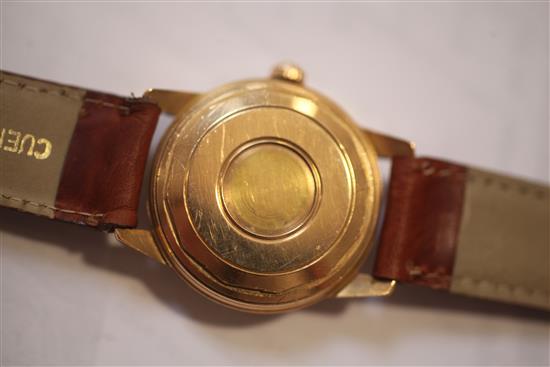 A gentlemans 1950s/1960s 18ct gold Longines Conquest automatic wrist watch,